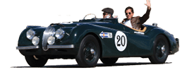 Two men are riding a vintage green sports car on a road. AI generated content